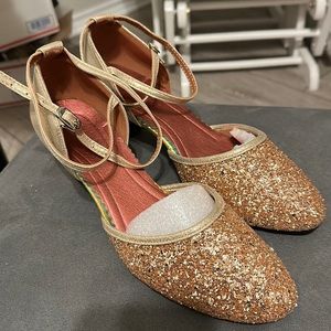 New glitter heels in a champagne color with gold trim